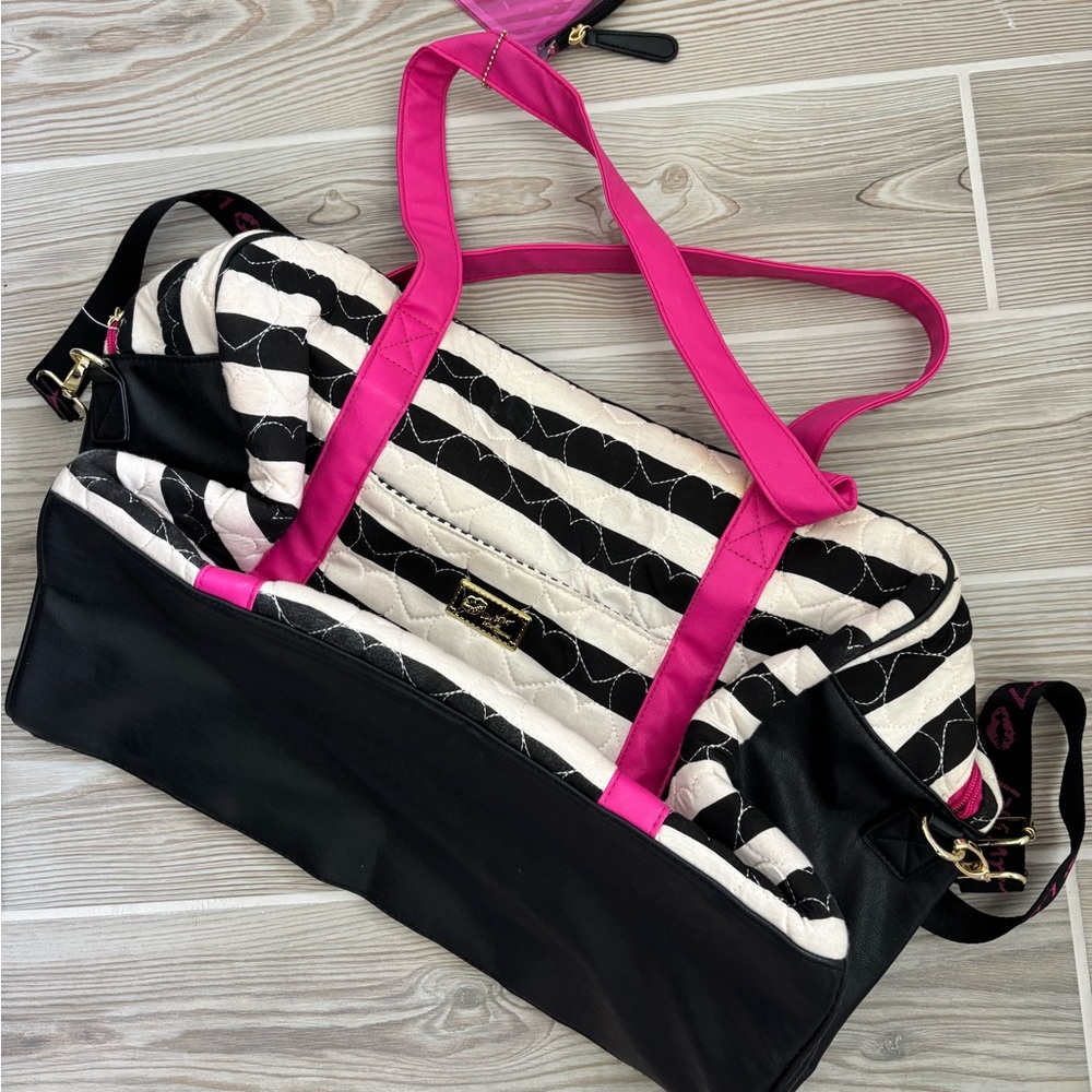 Betsey Johnson overnight bag.